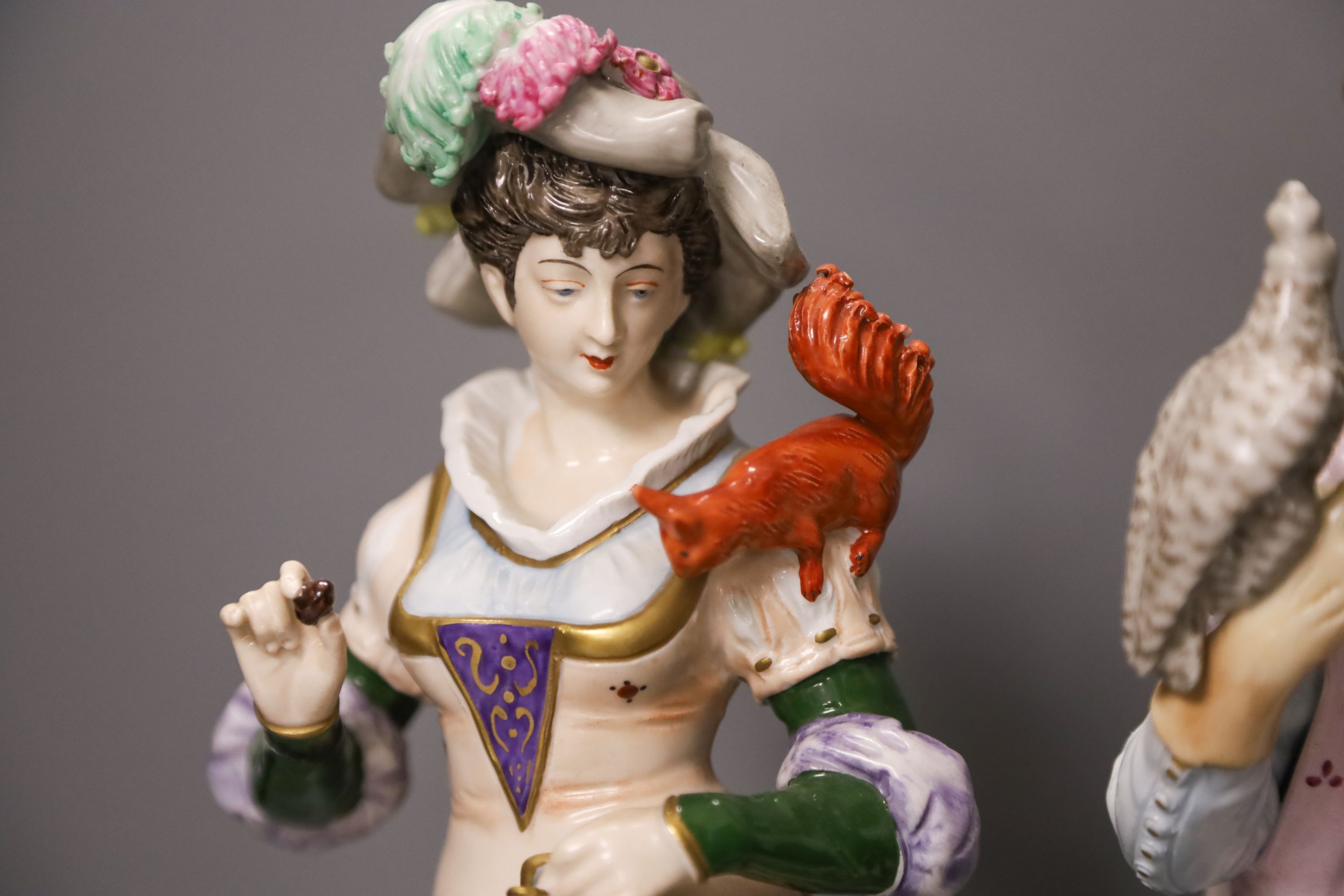 Two pairs of Continental porcelain figures, 35cm